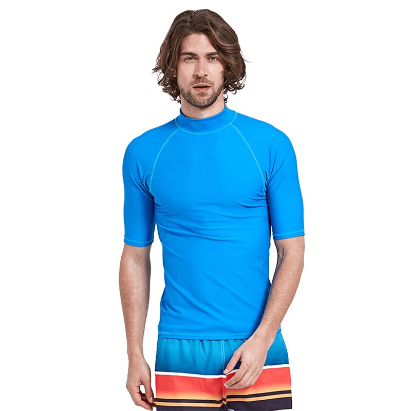 Man wearing blue Sports Elastic Beach T-shirt for water sports, short sleeve, UPF 50+ protection, perfect for diving and surfing.